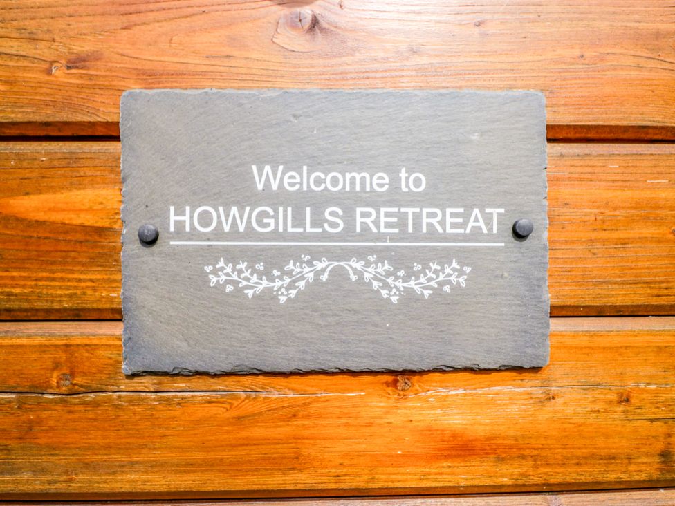 A welcome sign at Howgills Retreat Gatebeck near Kirkby Lonsdale