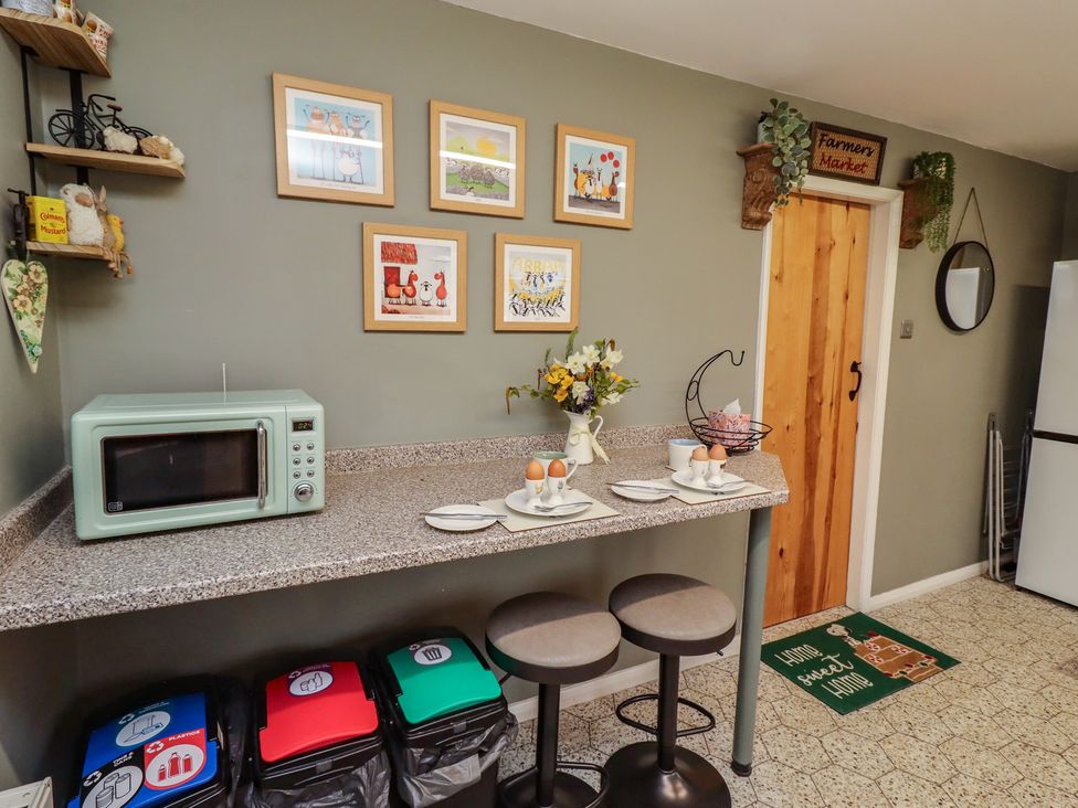 A kitchen with a microwave and countertop at Country Retreat in Ponteland