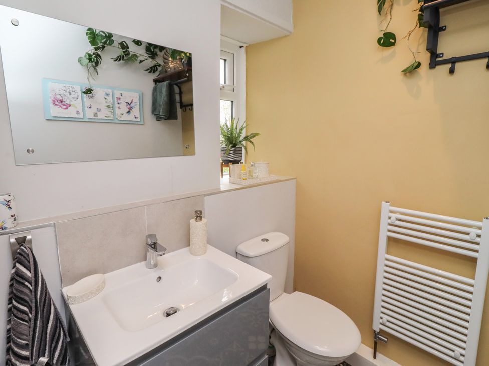 A bathroom with a sink and toilet at Country Retreat in Ponteland