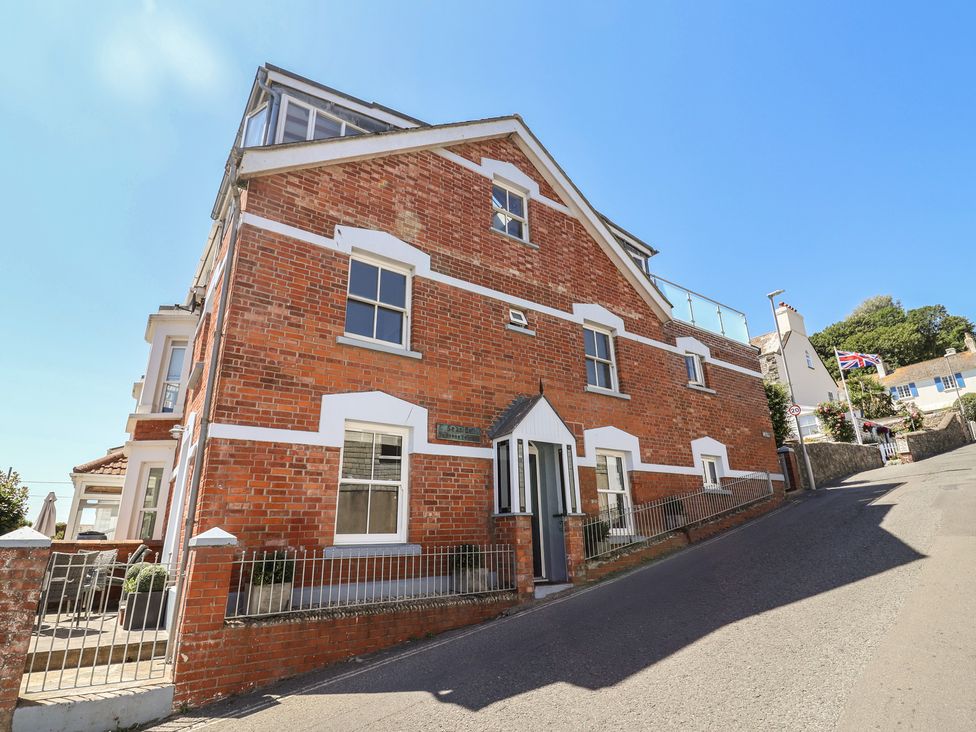 A brick building exterior on a street at Seaside in Lyme Regis