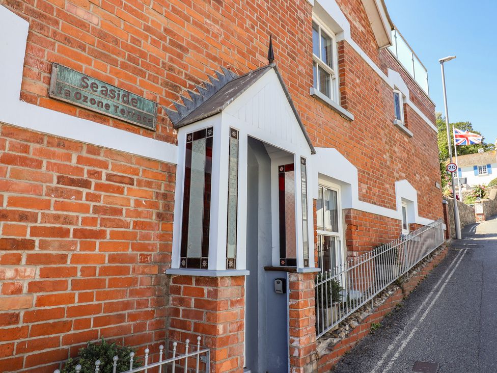 A brick wall and door at Seaside in Lyme Regis