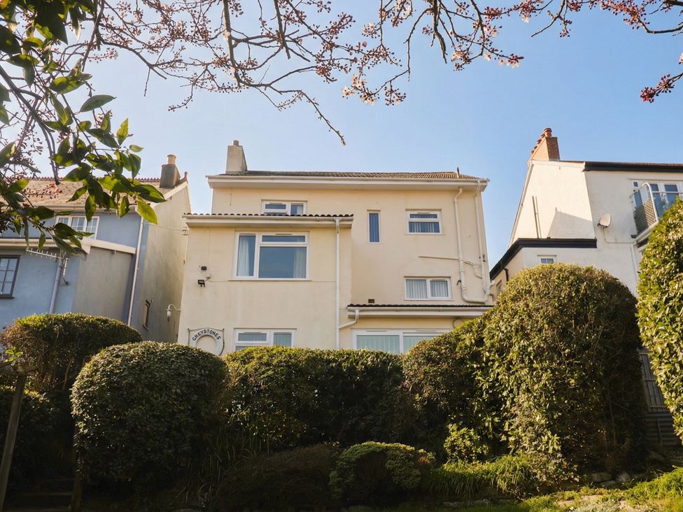 A house surrounded by bushes at Greystones Flat in Lyme Regis