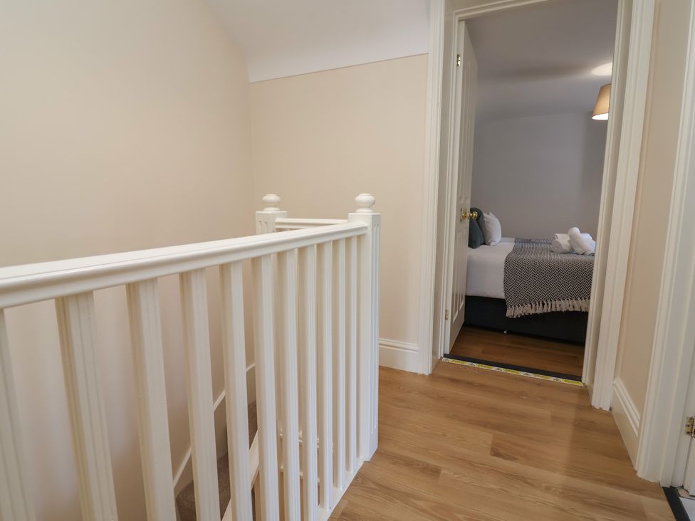 A hallway leading to a bedroom at 4 Green Farm Cottage Saughall