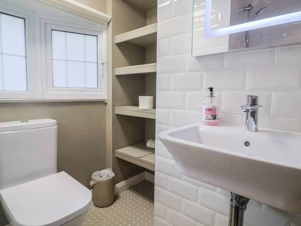 A bathroom with toilet and sink at Maries in Lyme Regis