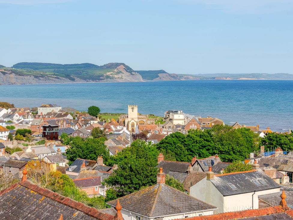 A view of houses and sea at 2 Hadleigh Villas in Lyme Regis