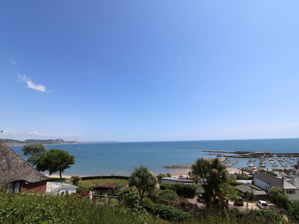 A view of the sea and boats at Penny Plot Cottage Lyme Regis