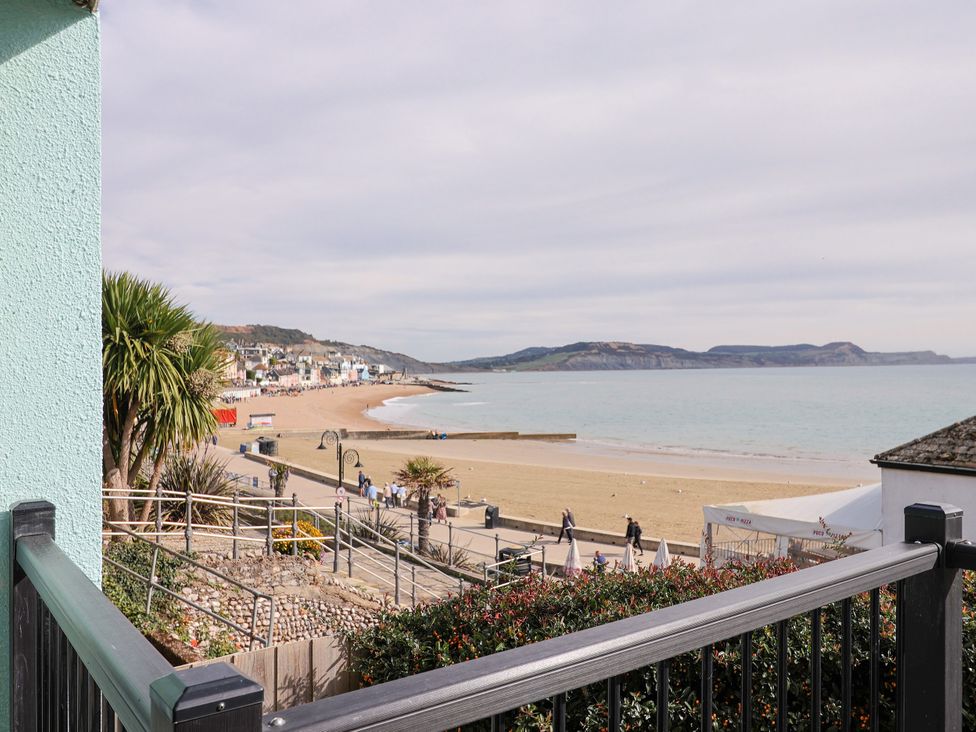 A view of the beach and ocean at 1 Wellhayes Lyme Regis