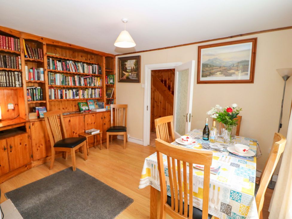A dining room with a table and chairs at Forest View Ballinskelligs County Kerry