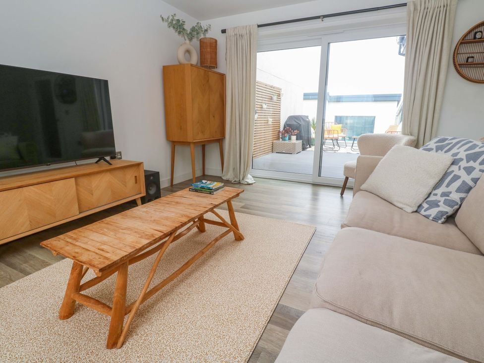 A living room with a sofa and coffee table at 6 Chapel Rock Close Perranporth
