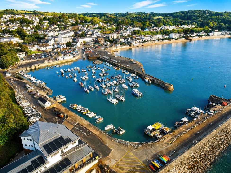 A marina with boats and a pier at 6 Coedrath Park - Swn y Mor in Saundersfoot