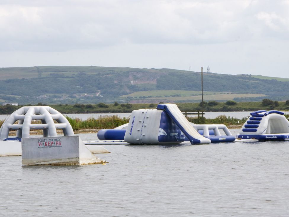 Inflatable water obstacle course at Pott Haveigg Wakepark in Haverigg