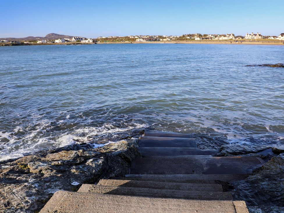 Steps leading down to the water near houses at Apartment 3 in Trearddur Bay