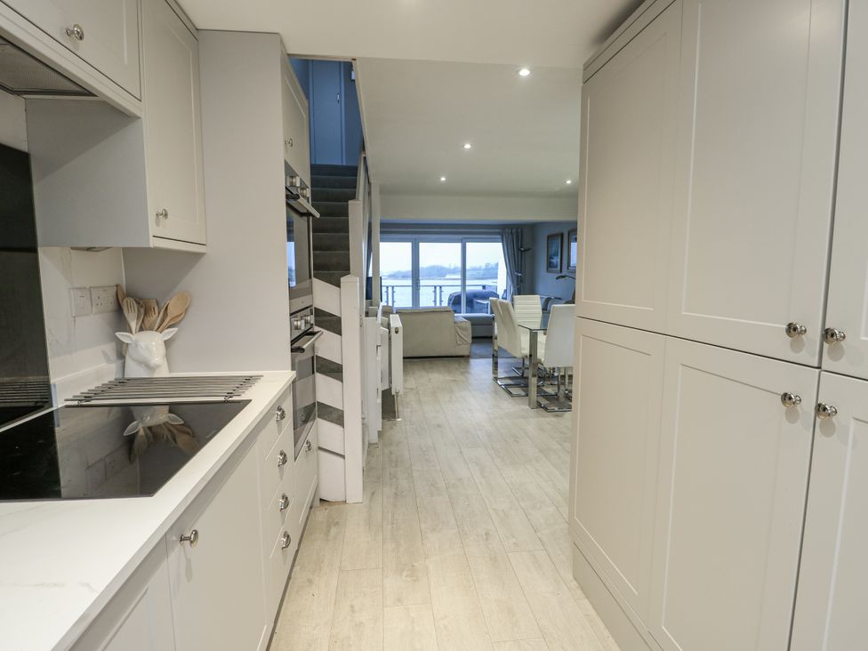 A kitchen leading to a living area at White Sails Y Felinheli