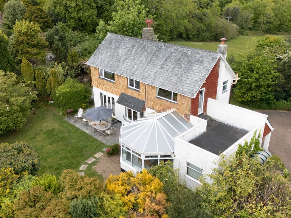 A house with conservatory and garden at 7 Duporth Bay in St. Austell