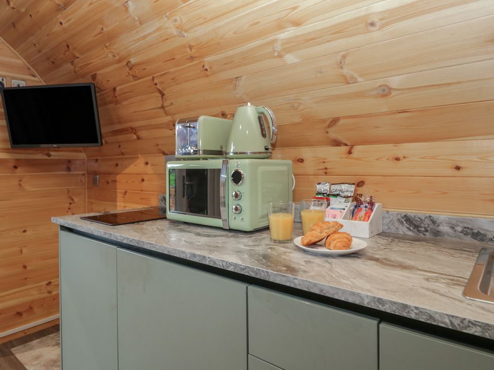 A kitchen with a kettle and microwave at Beech in Ulverston