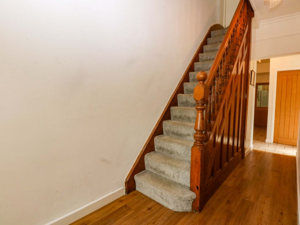 A staircase in a hallway at Y Berth Caernarfon