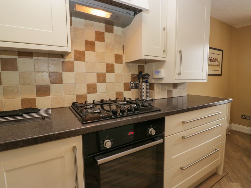 A kitchen with gas hob and oven at Jenny's in Hawkshead