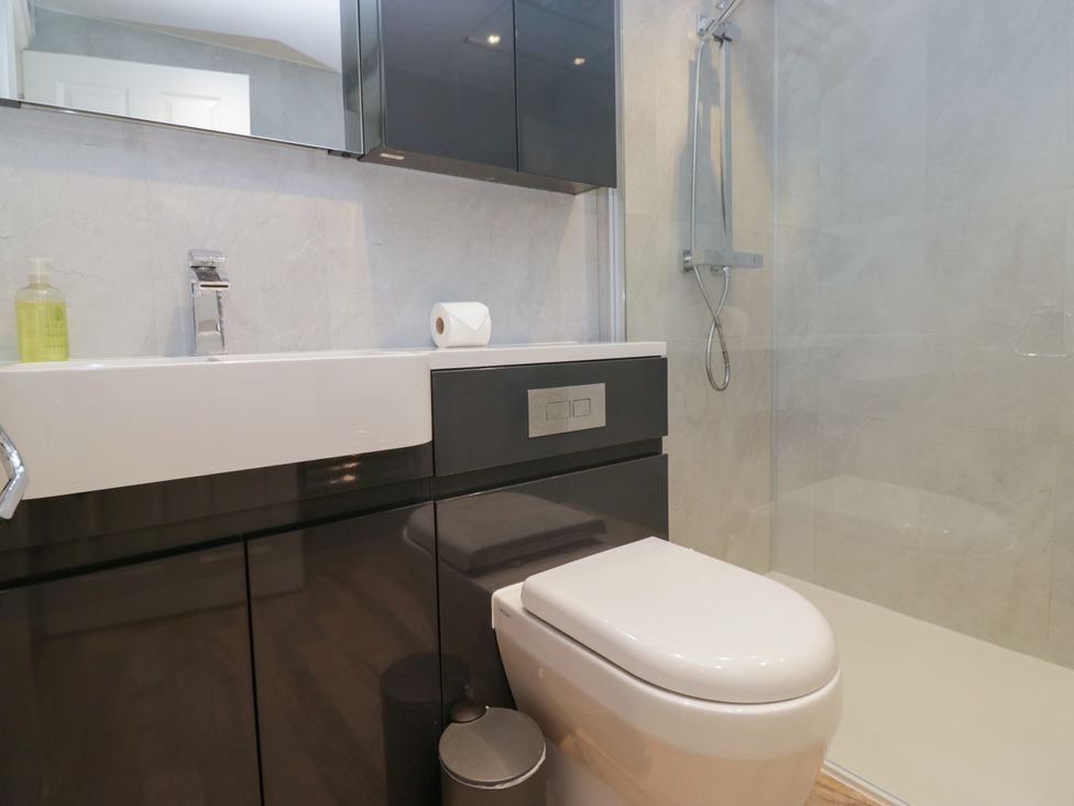 A bathroom with a sink and shower at Jenny's in Hawkshead