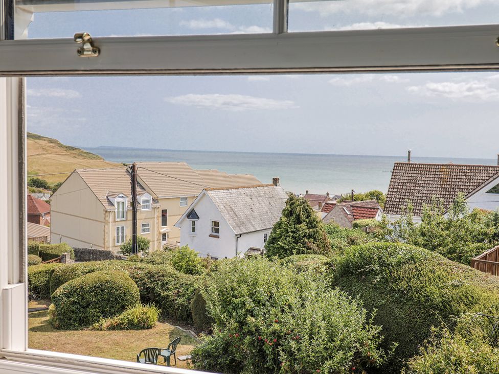 A view of houses and the ocean at St Helena in Charmouth