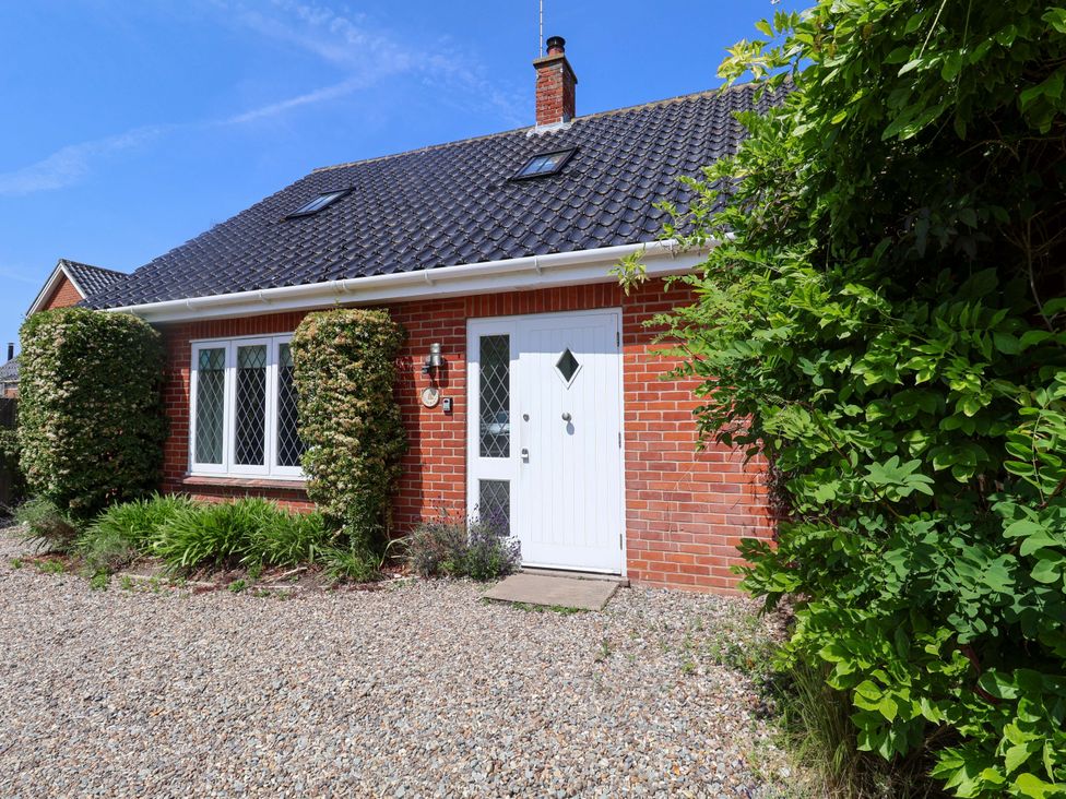 A house with a front door and windows at Seadrift Dunwich Near Westleton
