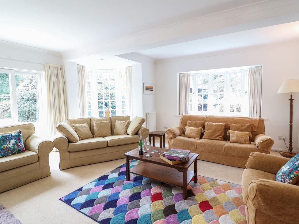 A living room with sofas and a coffee table at Rippleway, Walberswick