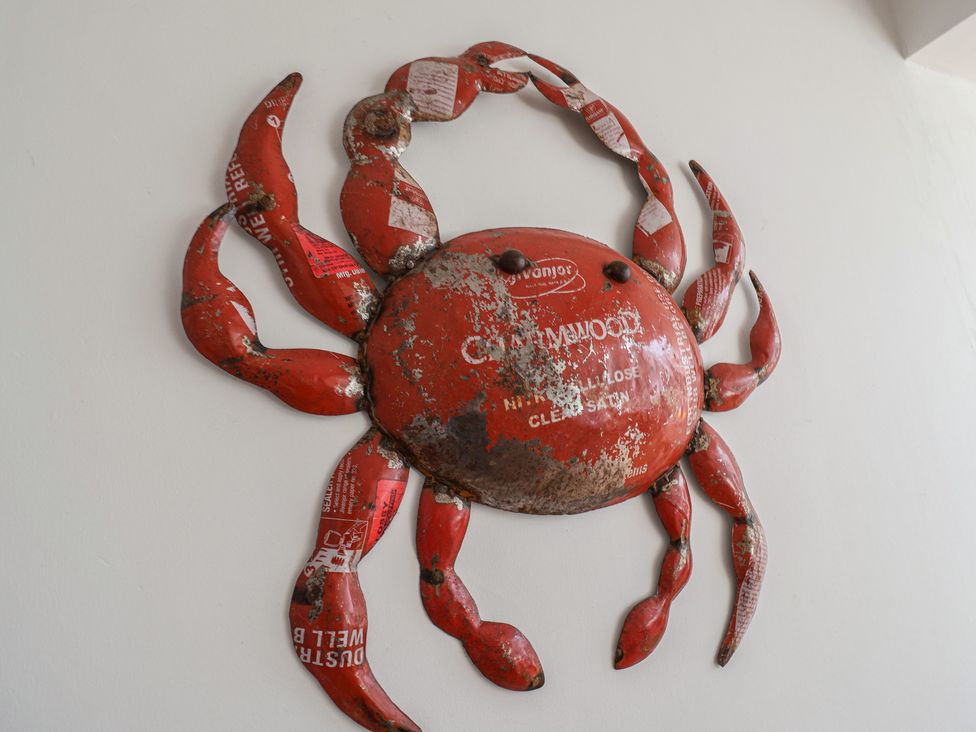 A crab decor piece mounted on a wall at Rippleway, Walberswick