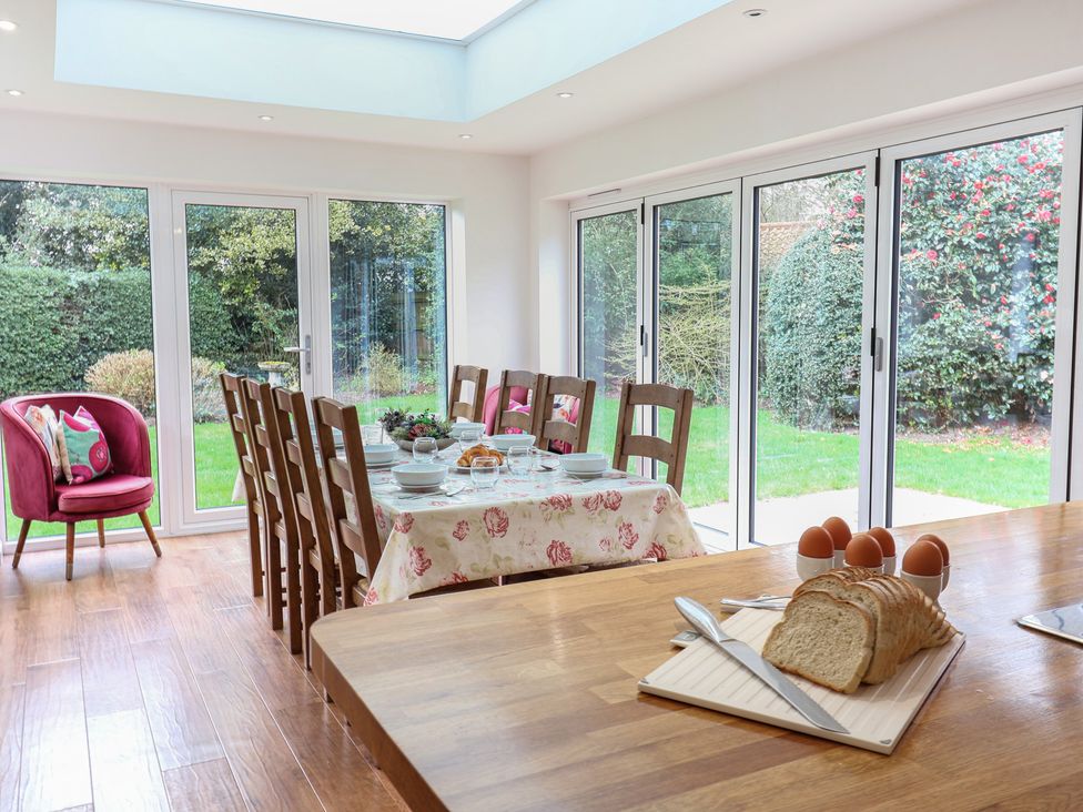 A dining room with a table and chairs at Rippleway, Walberswick