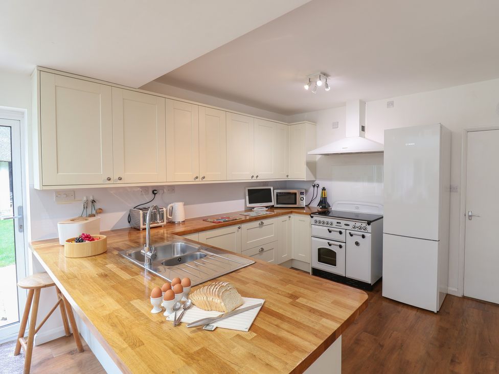 A kitchen with appliances and a countertop at Rippleway, Walberswick