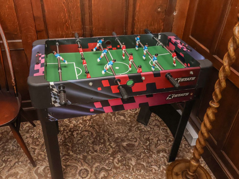 A foosball table in a game room at Henstead Hall Henstead near Beccles