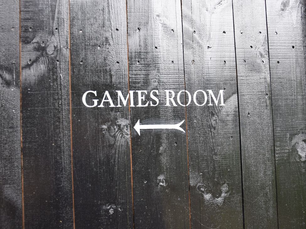 A sign indicating the Games Room at Yew Tree Farm Barn and Stable Framlingham