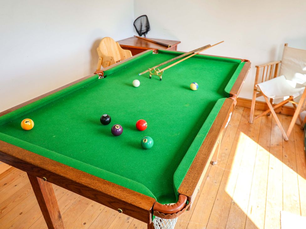 A pool table with balls and cues in Robert Sadler's Studio Aldeburgh