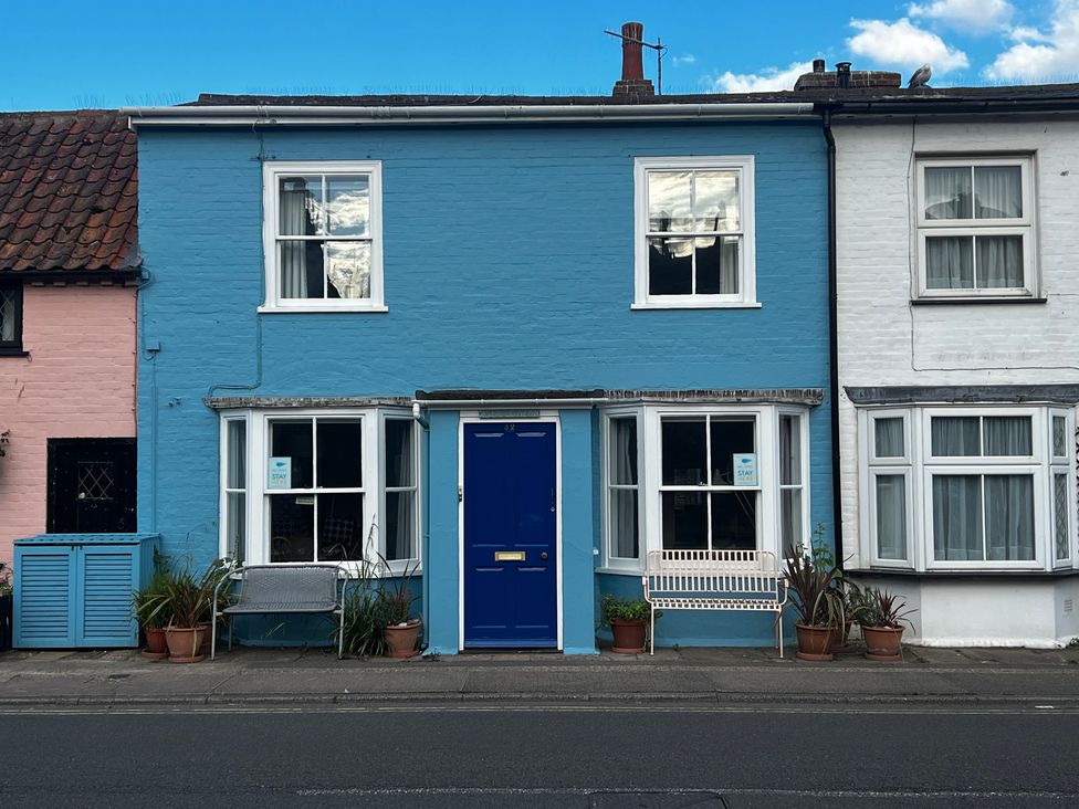 A house with blue and white exterior and a blue door at Seaflower, Aldeburgh