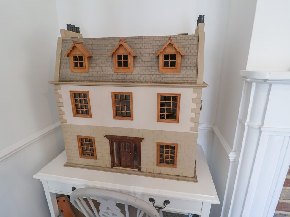 A dollhouse displayed on a table at High Ground, Reydon