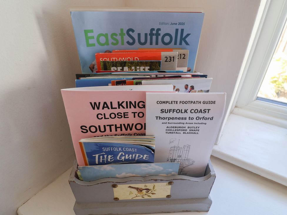 A collection of brochures and guides in a holder at High Ground, Reydon