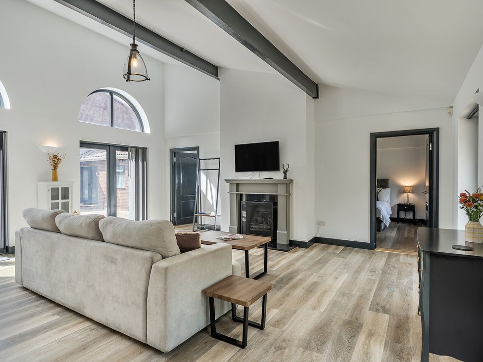 A living room with a sofa and coffee table at The Annex in Wimborne Minster