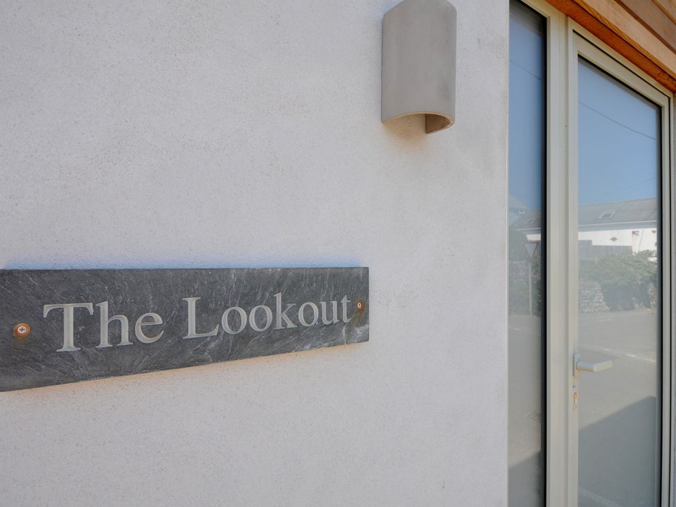 A sign indicating The Lookout at The Lookout in Polzeath