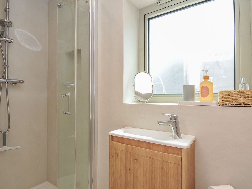 A bathroom featuring a shower and sink at The Lookout in Polzeath