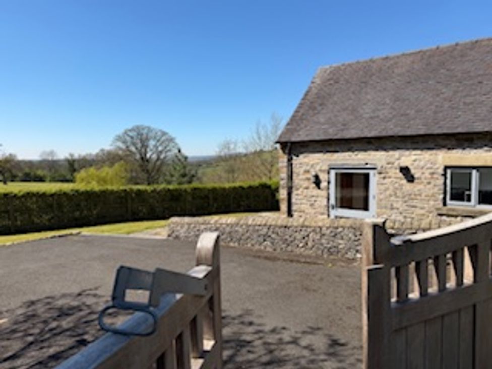 A house with a gate and garden at Postbox Cottage Atlow near Ashbourne