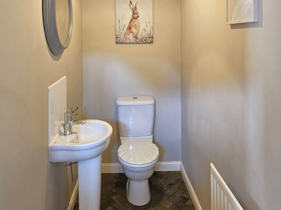 A bathroom with a sink and toilet at The Milne in Todmorden