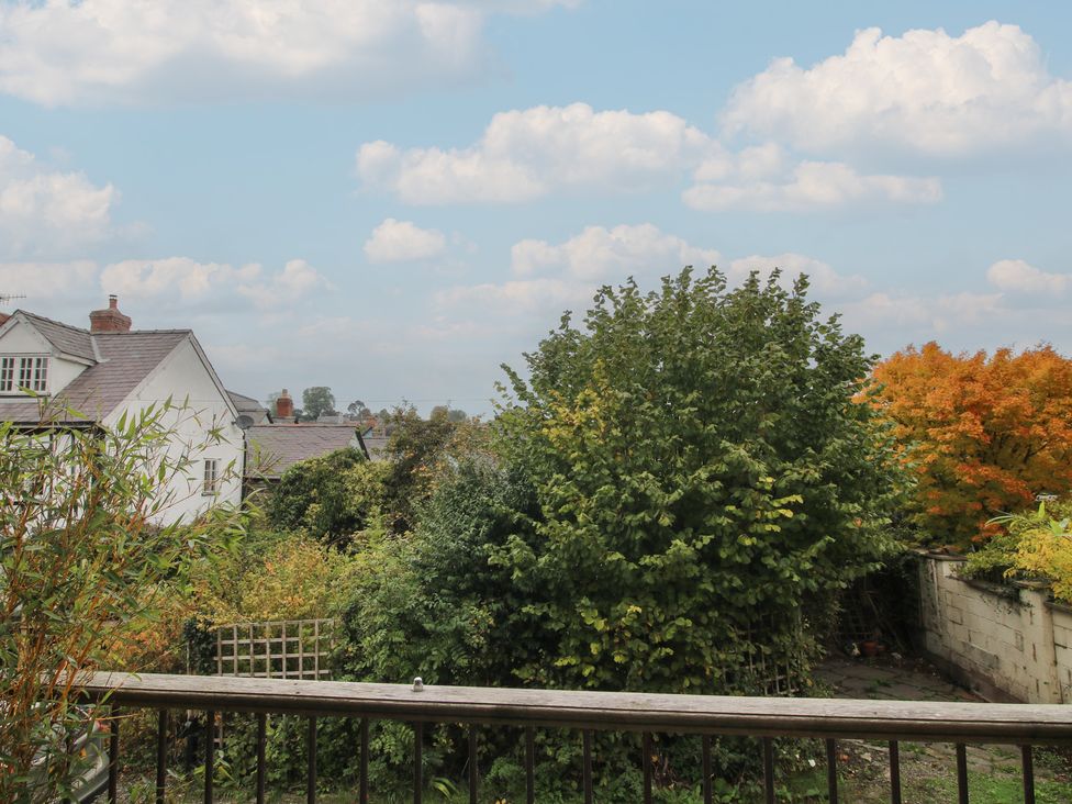 A view of trees and buildings at Malt House