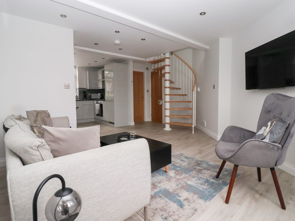 A living room with a sofa and coffee table at Moor View in Skipton