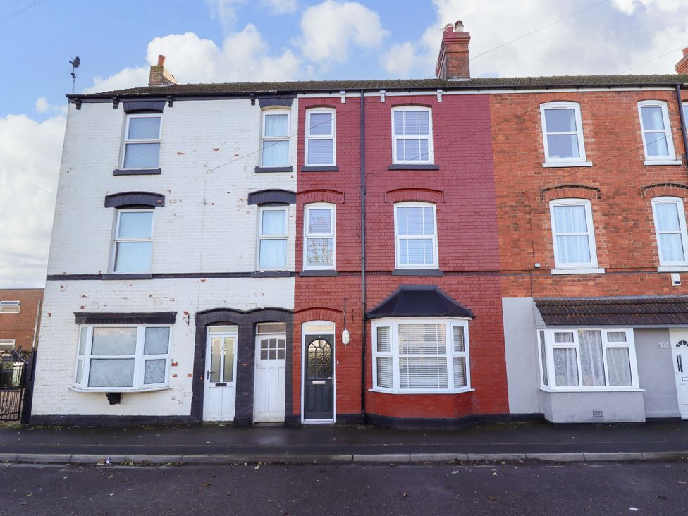 A red and white brick residential building at 9 Alford Road