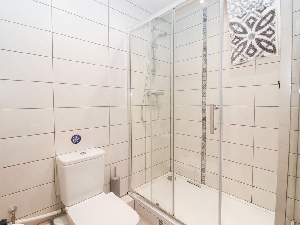 A bathroom with a shower and toilet at Waters View in Skipton