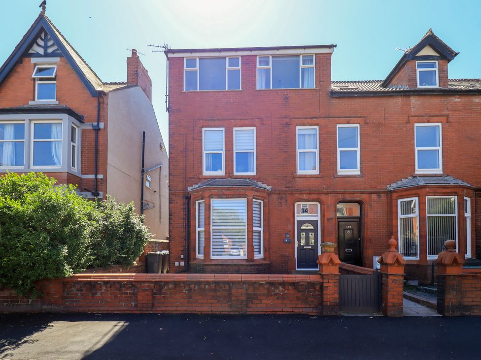 A house exterior with windows and door at The Nest in Lytham St. Annes
