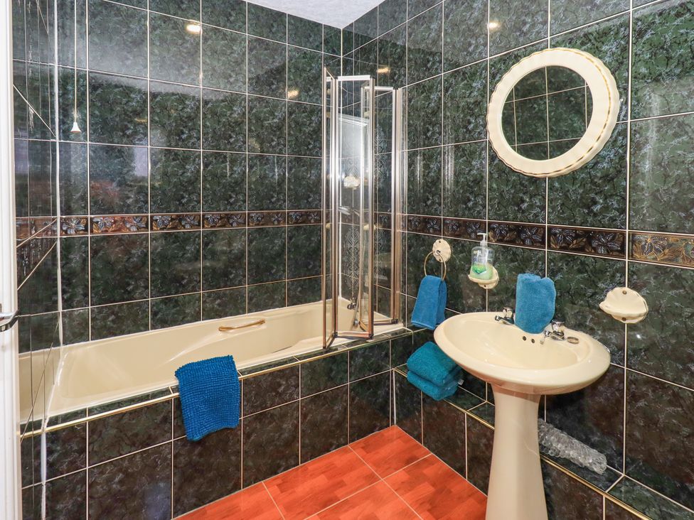 A bathroom with bathtub and shower at The Nest in Lytham St. Annes