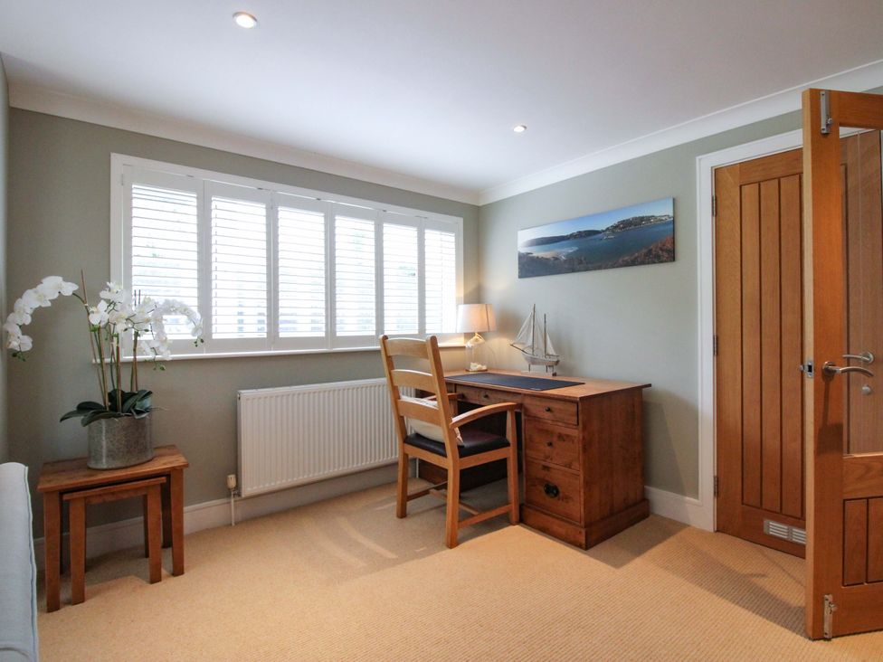 A home office with a desk and chair at Welsummer in Salcombe