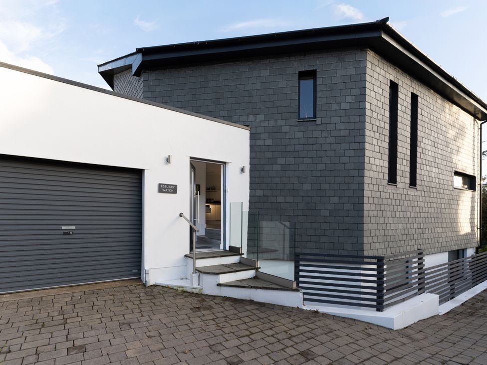 A modern house exterior with steps and garage at Estuary Watch Lelant near Carbis Bay