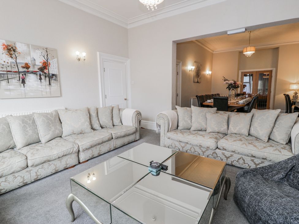A living room with sofas and a coffee table at The Keep in Llandudno