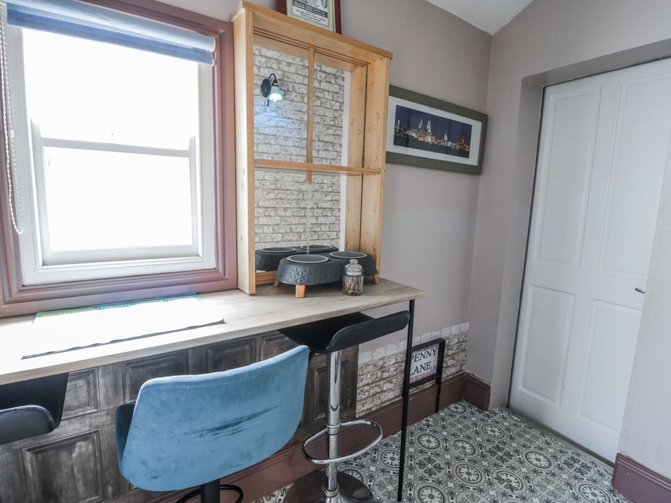 An office with a desk and bar stool at The Keep Llandudno