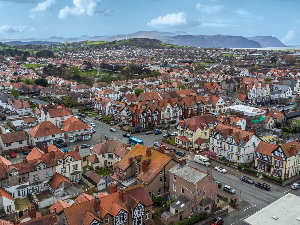 An aerial view of houses and streets in Llandudno
